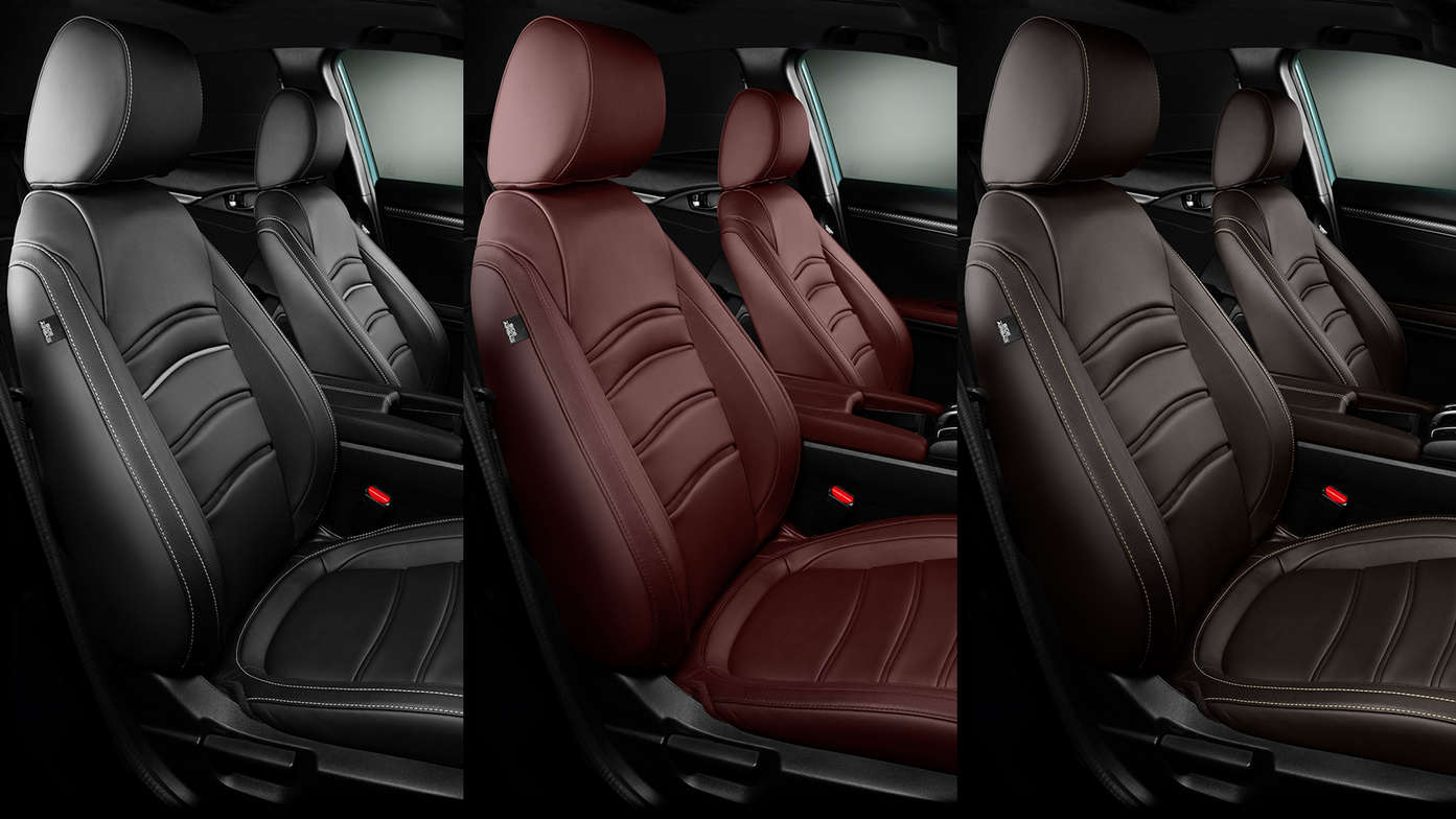 Nærbilde av skinntrekk i Honda Civic 5-dørs i fargene Bordeaux Red, Midnight Black og Dark Brown.