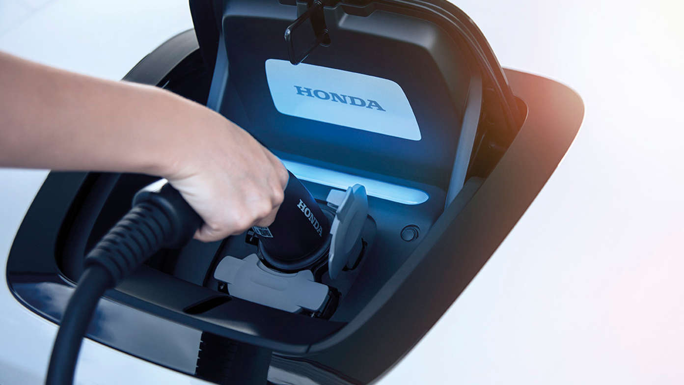 Nærbilde av strømlader i Honda e.