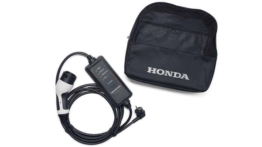 Nærbilde av strømlader for Honda e med modus 2-ladekabel.