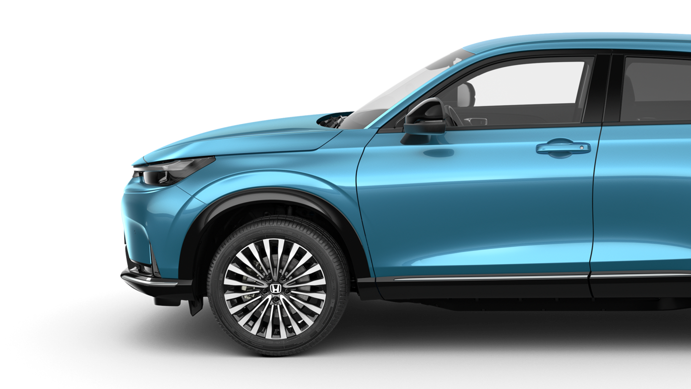 Sidevisning av fronten av en bil, en blå Honda e:Ny1